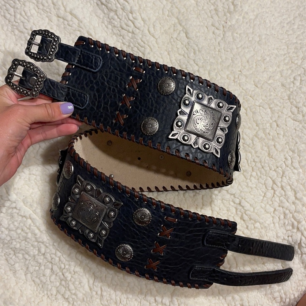 Black belt with brown stitching. Size small-medium